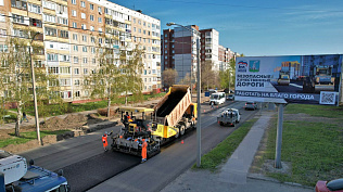 На улице Солнечная Поляна приступили к укладке асфальта  по дорожному нацпроекту